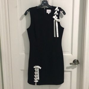 Sleeveless black dress cream grosgrain ribbon trim